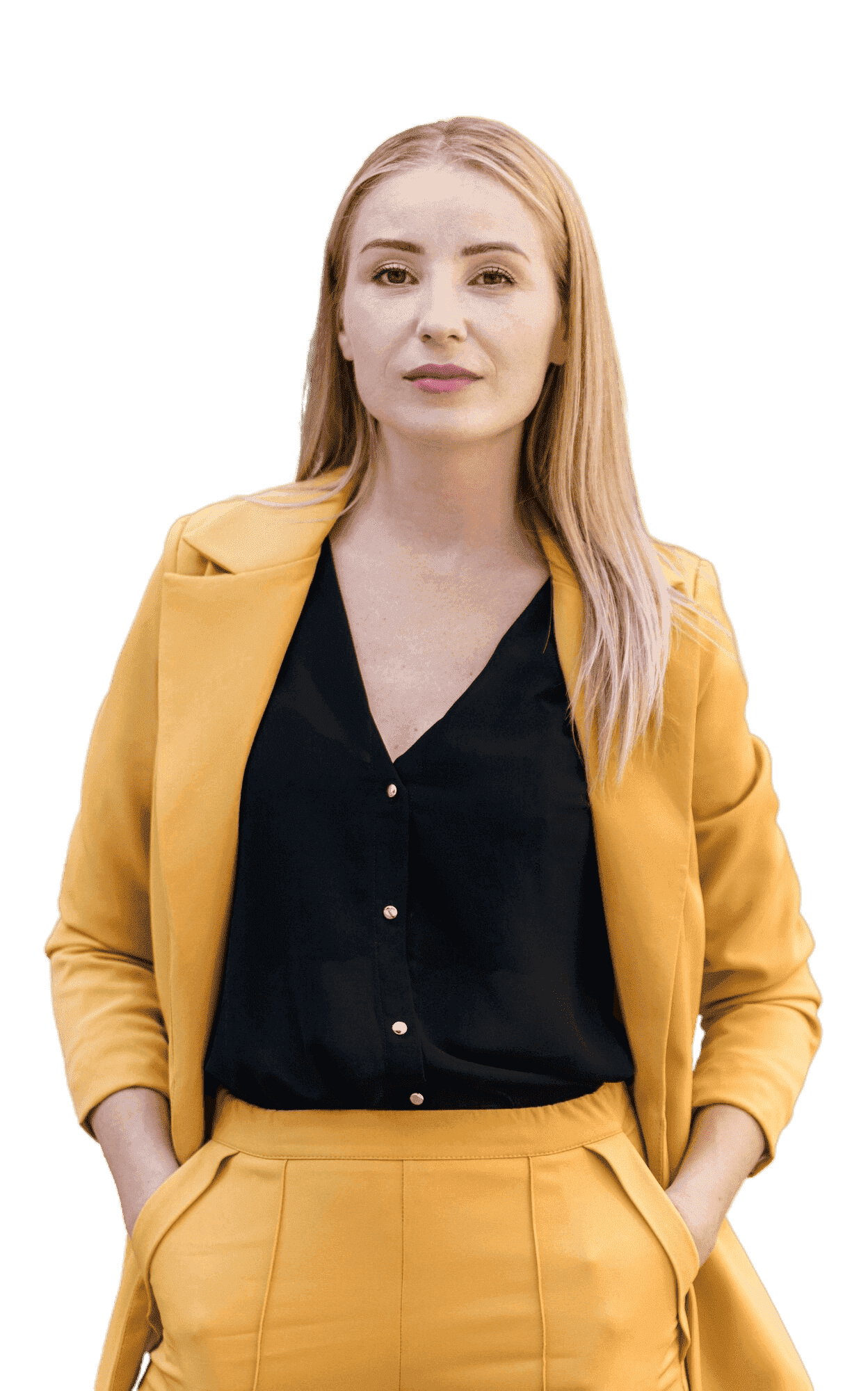 A woman wearing a yellow suit and black shirt